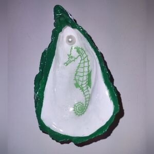 Seahorse print decoupaged onto oyster